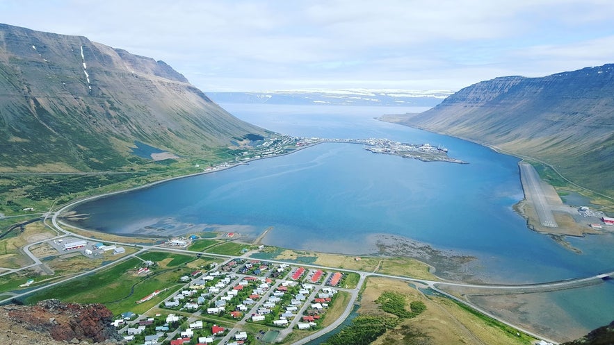 The town of Isafjordur is framed by towering mountains