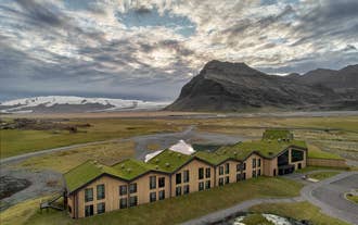 Stunning views of mountains and glaciers surround the Hotel Jokulsarlon, also known as Glacier Lagoon Hotel.