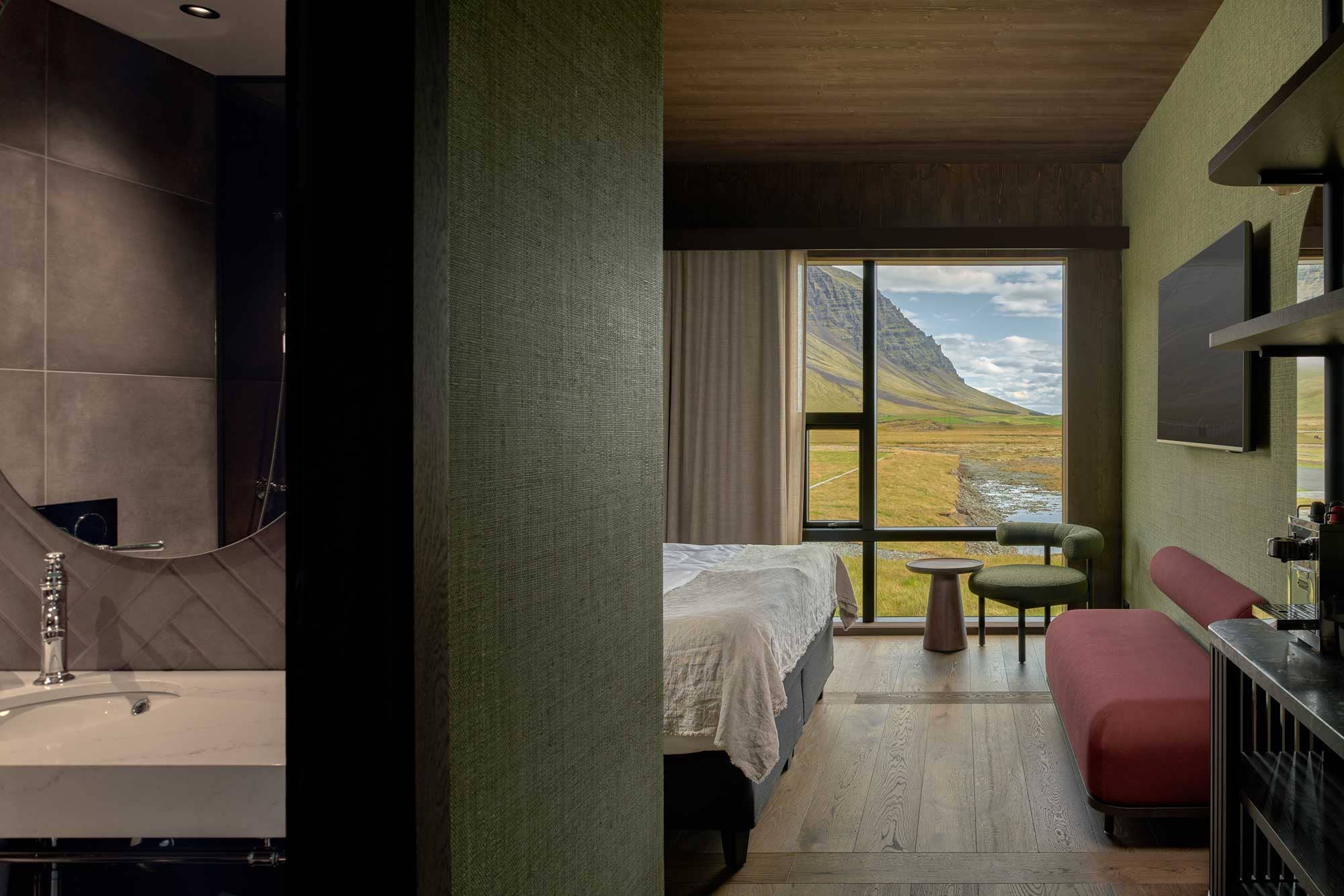A double room at Hotel Jokulsarlon with mountain views.
