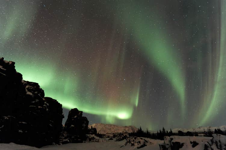 Auroras cascade from the skies of Iceland.
