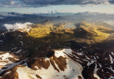 Beautiful peaks surround the serene Alftavatn lake in the Highlands of Iceland.