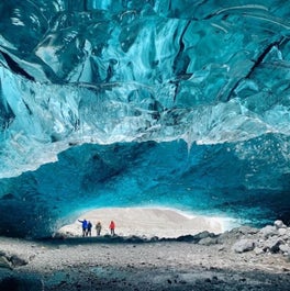 Guests marveling at an ice cave.