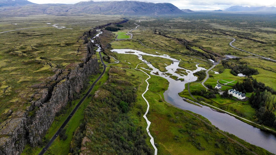 Aerial view of Thingvellir National Park with Almannagja Gorge, Oxara River, and Lake Thingvallavatn in Iceland.