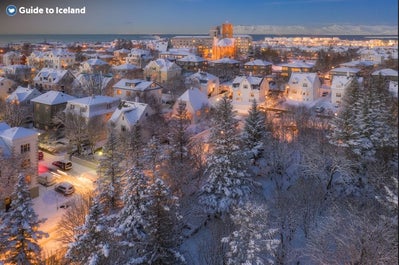 Snow covers the houses in Reykjavik.