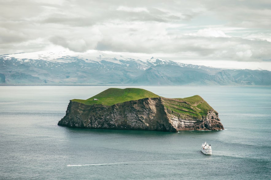 A boat sailing towards the Westman Islands in Iceland.