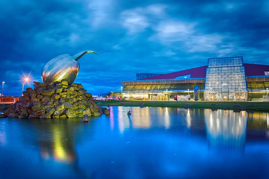 Keflavik International Airport and its Jet Nest sculpture stand at dusk on the Reykjanes Peninsula, the site of one of the seven weather stations in the wind study.