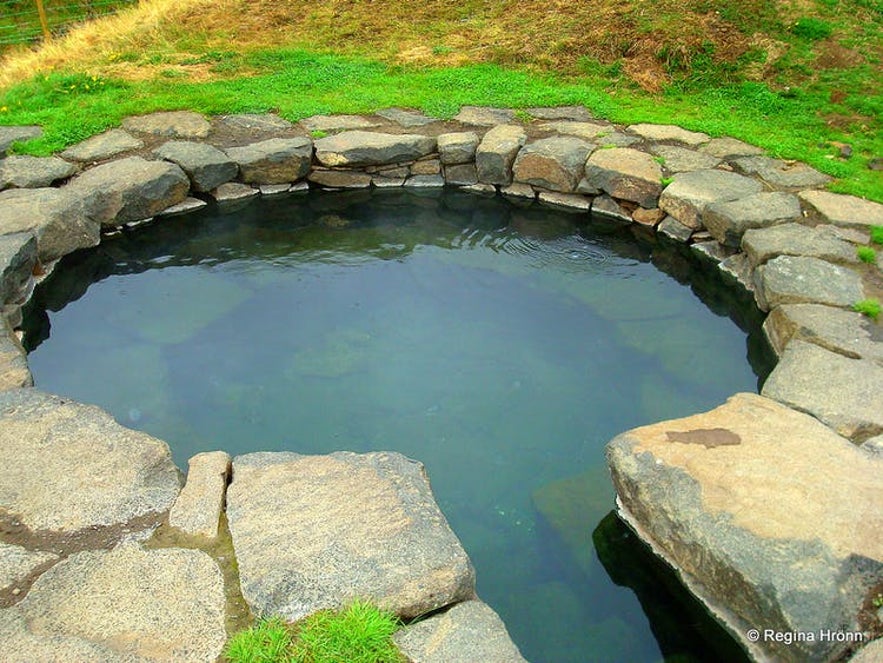 A small pool in Iceland, perfect for geothermal bathing.