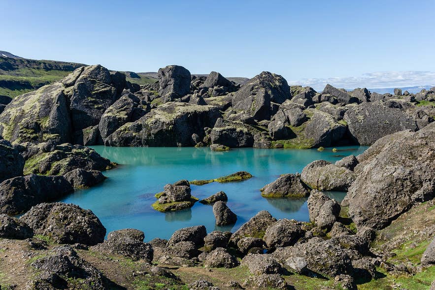 Storurd in East Iceland is one of the hidden gems in Iceland, with turquoise pools and giant boulders on the Viknaslodir Trails.