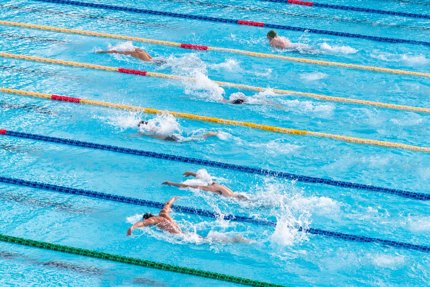 Keep fit by swimming in Iceland.