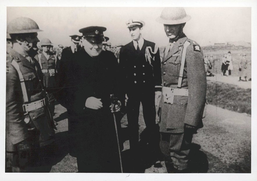 British Prime Minister, Winston Churchill, walking down a street in Reykjavik.