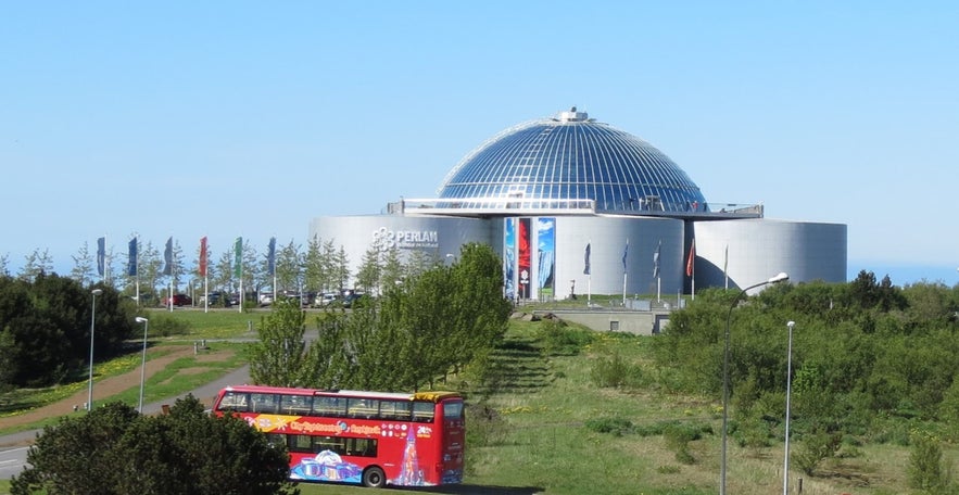 Perlan Museum and Observation Deck overlooks Öskjuhlíð woods.