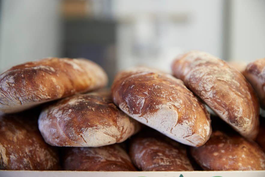 Freshly baked Icelandic bread served warm, a staple food in Iceland. Freshly baked Icelandic bread served warm, a staple food in Iceland.
