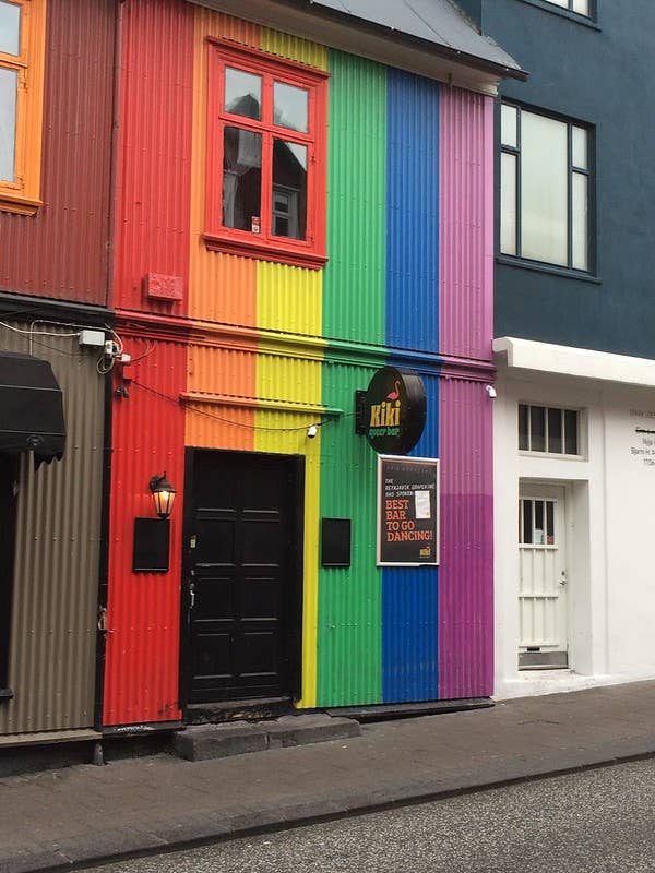 Rainbow-painted Kiki Queer Bar on Laugavegur Street, a lively spot for parties and happy hour in Reykjavik.