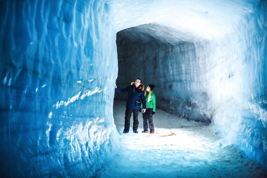 Into the glacier ice cave tunnel