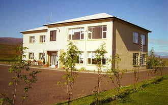 Hlin Guesthouse on a summer's day.