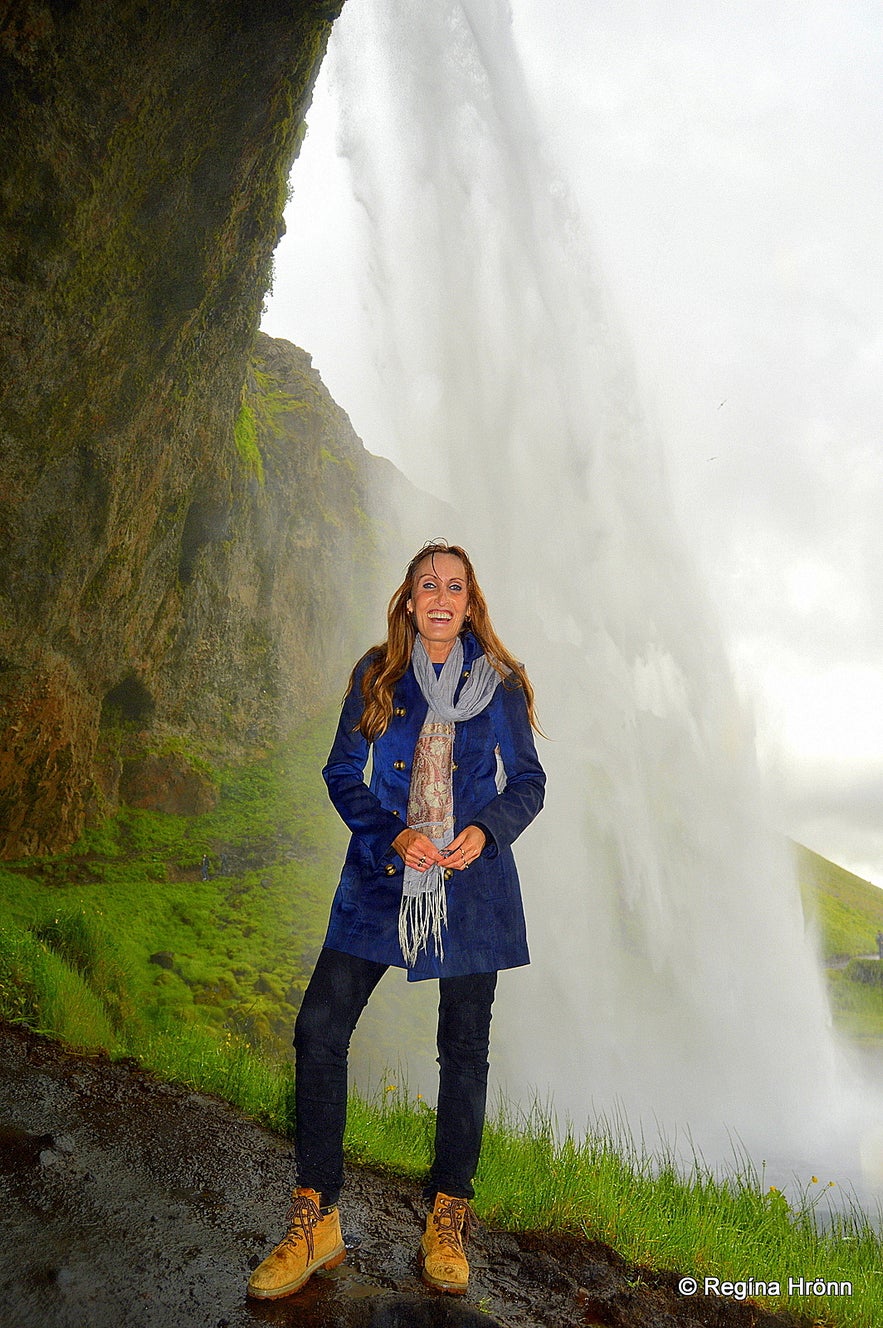 Regína soaking after walking behind Seljalandsfoss