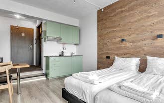 Bolholt apartments bedroom and kitchenette.jpg