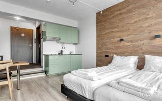 Bolholt apartments bedroom and kitchenette.jpg