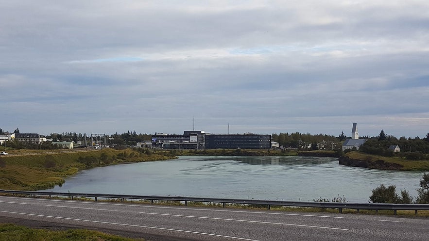 Selfoss overlooks a river.