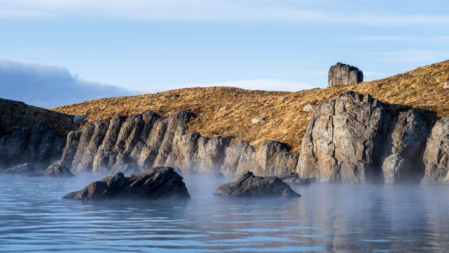 The coastline is rocky around the Sky Lagoon.