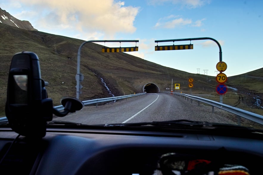 Almannaskarðsgöng - tunnel on the ring road 1 near Höfn town. Entry from the Northeast side how it looks from the moving car. Almannaskarðsgöng - tunnel on the ring road 1 near Höfn town. Entry from the Northeast side how it looks from the moving car.