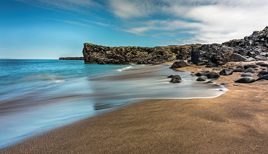 Skarðsvík, Skardsvik sandy beach (Hellissandur) in west iceland on a sunny spring day Skarðsvík, Skardsvik sandy beach (Hellissandur) in west iceland on a sunny spring day