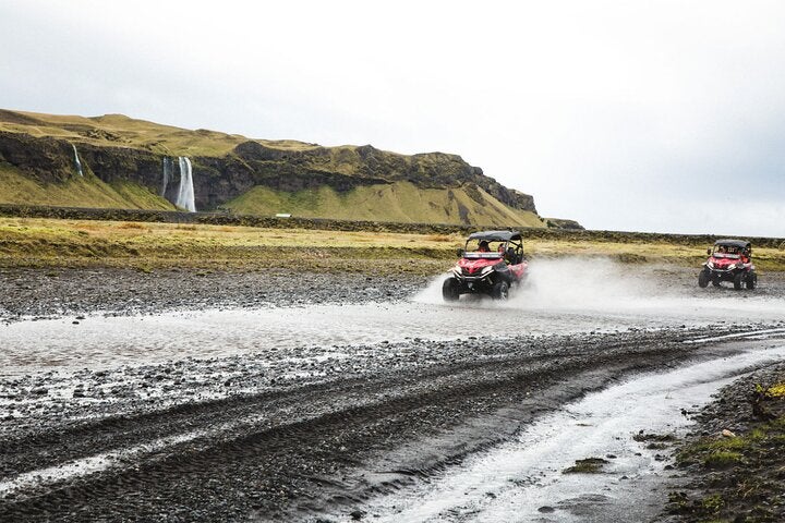 A buggy vehicle traversing a beautiful landscape in South Iceland.