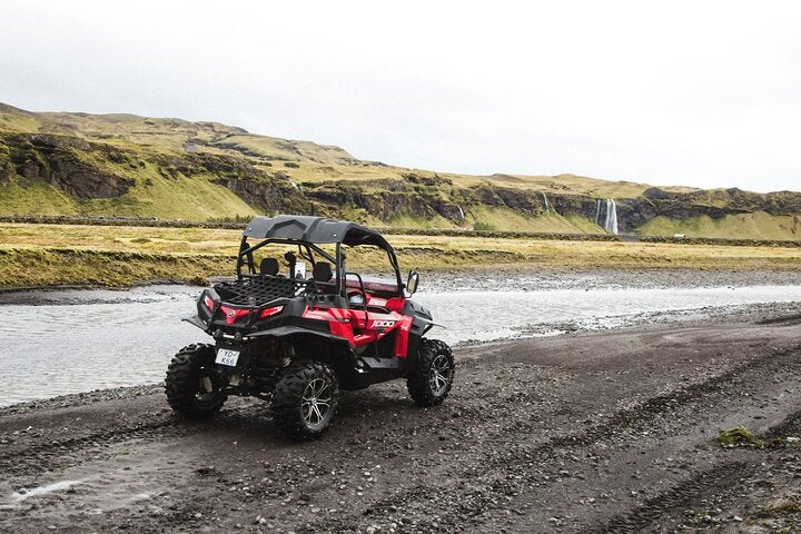 A buggy parked on a gravel road on Iceland's South Coast.