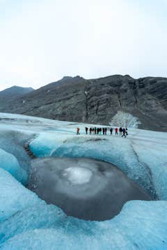 Adventurous 6-Hour Glacier Hiking and Ice Caving Tour with a Super Jeep Ride from Jokulsarlon