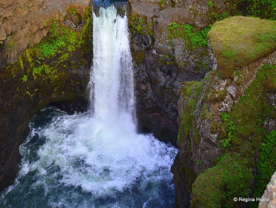 The lower Kolufossar waterfall in the canyon 