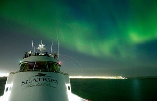 A Seatrips vessel sailing out of port.