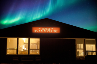 Hotel Hvammstangi Guesthouse under the aurora borealis.