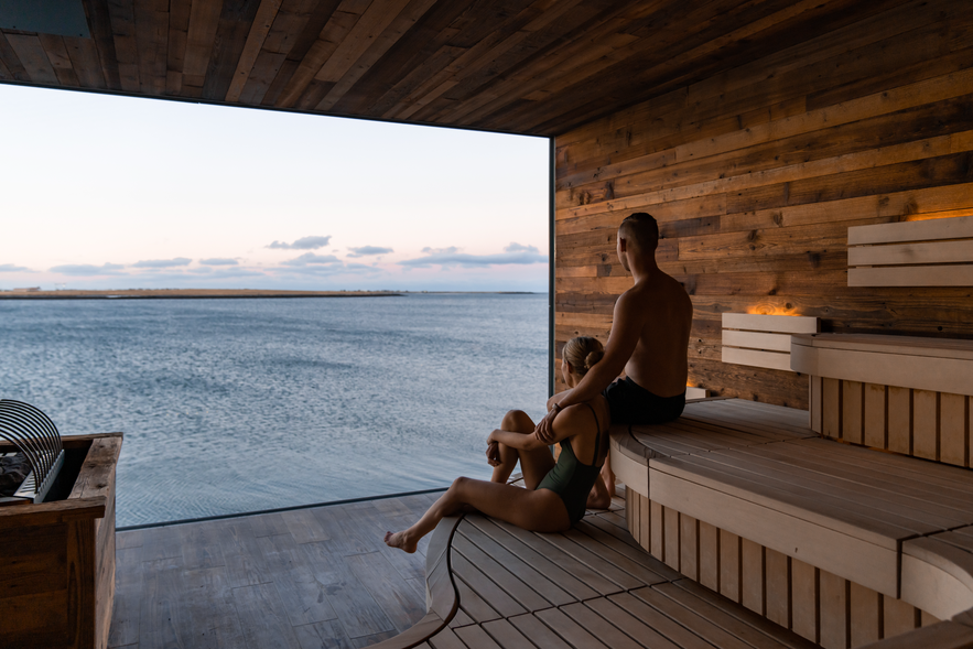 Couple inside a Sauna in Sky Lagoon Spa.