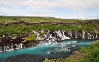 IJsgrotexcursie In de Gletsjer met Waterval Hraunfossar & Transfer vanuit Reykjavik