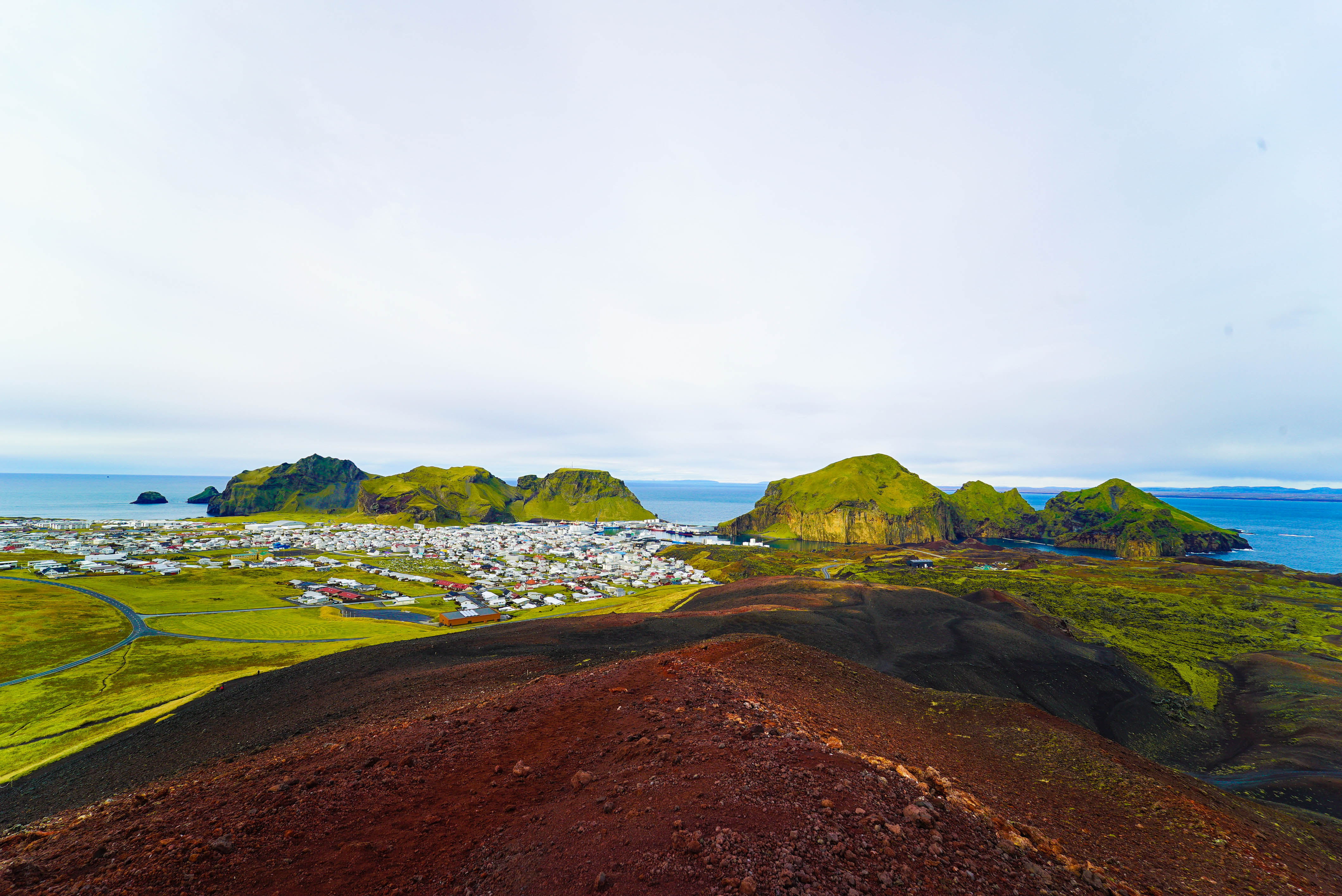 A road runs through Heimaey in the Westman Islands.