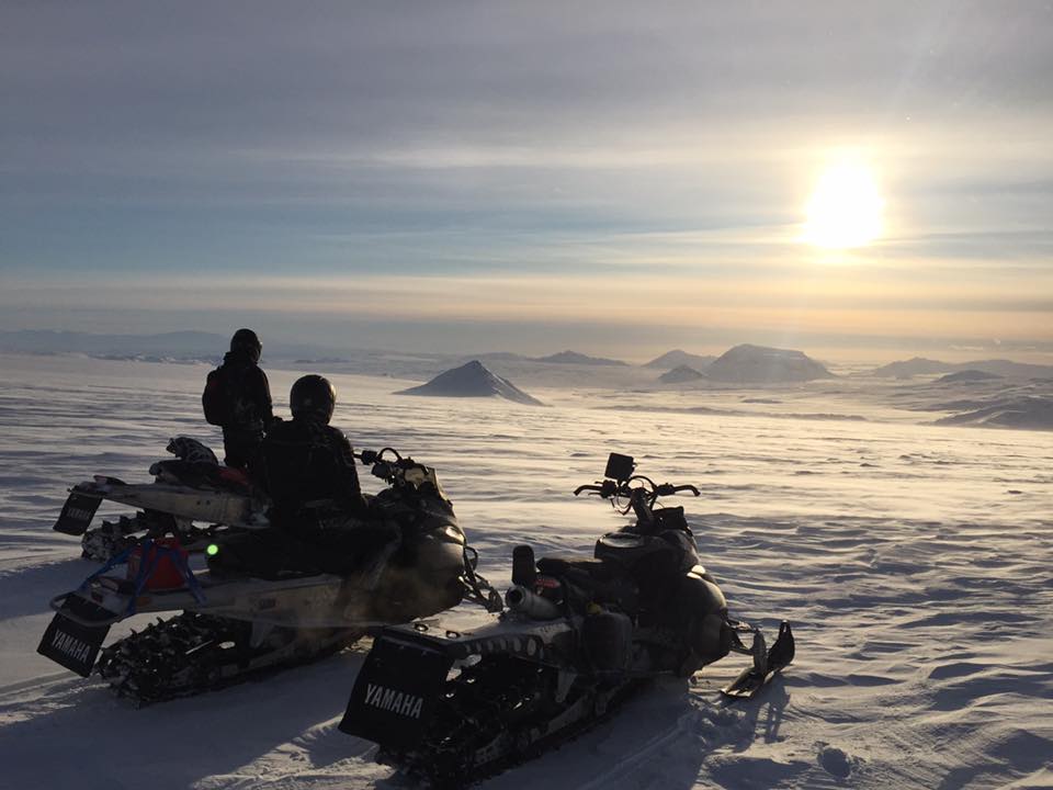 Snowmobilers scale the slopes of Langjokull.