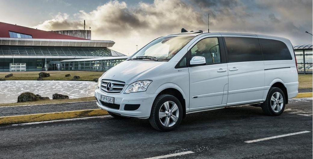 A private vehicle departs from KEF International Airport