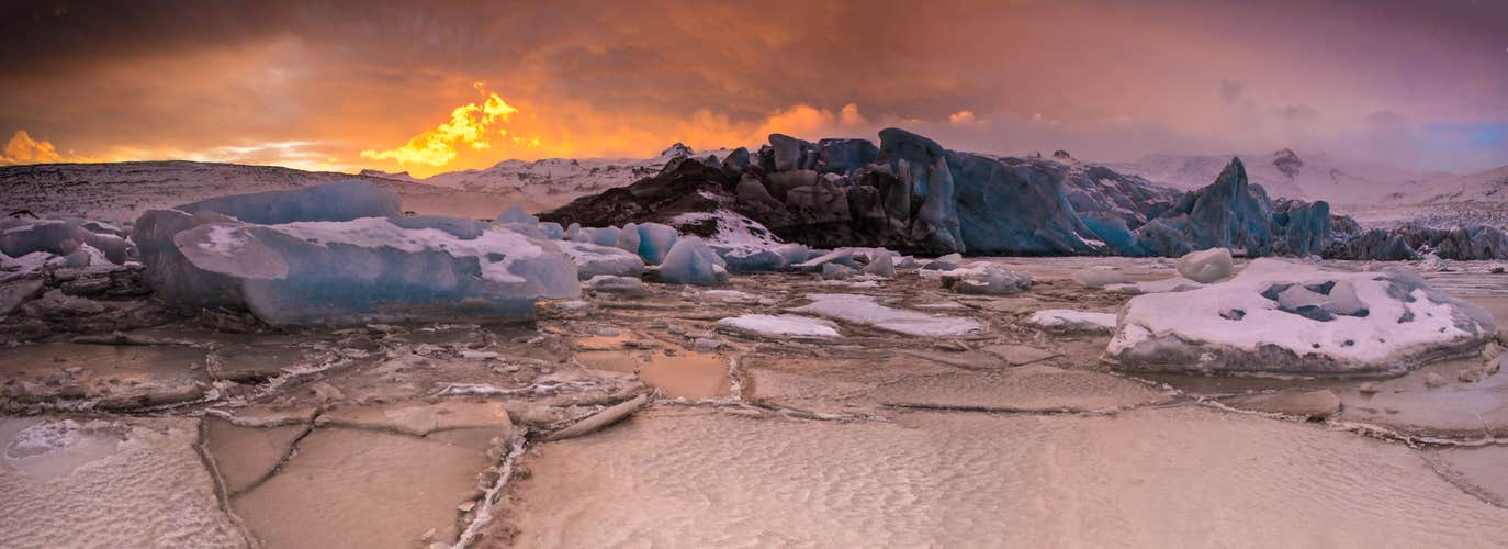 The towering ice wall of Fjallsjokull Glacier in Vatnajokull National Park looks fantastic at sunset.