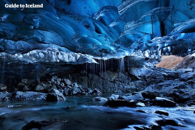 Water trickles from the ceiling of an ice cave.