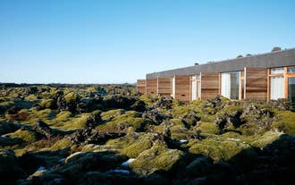 Silica Hotel at Blue Lagoon Iceland is surrounded by moss-covered lava fields.