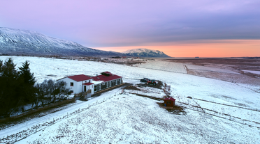 Karuna Guesthouse is surrounded by stunning, snowy landscapes.