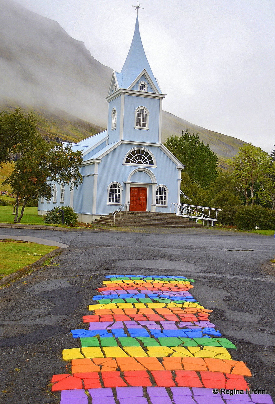 The rainbow street in Sey&eth;isfj&ouml;r&eth;ur and the blue church