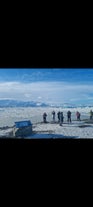 Photographers enjoy the glacier lagoons of Iceland.