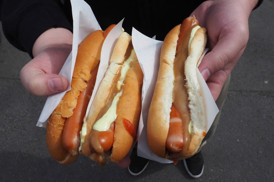 Icelandic hot dogs are served with ketchup, onions, remoulade and Icelandic hot dog mustard