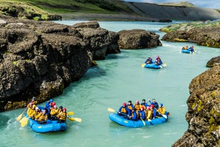 Enjoy the gentle current on a river rafting tour in South Iceland.