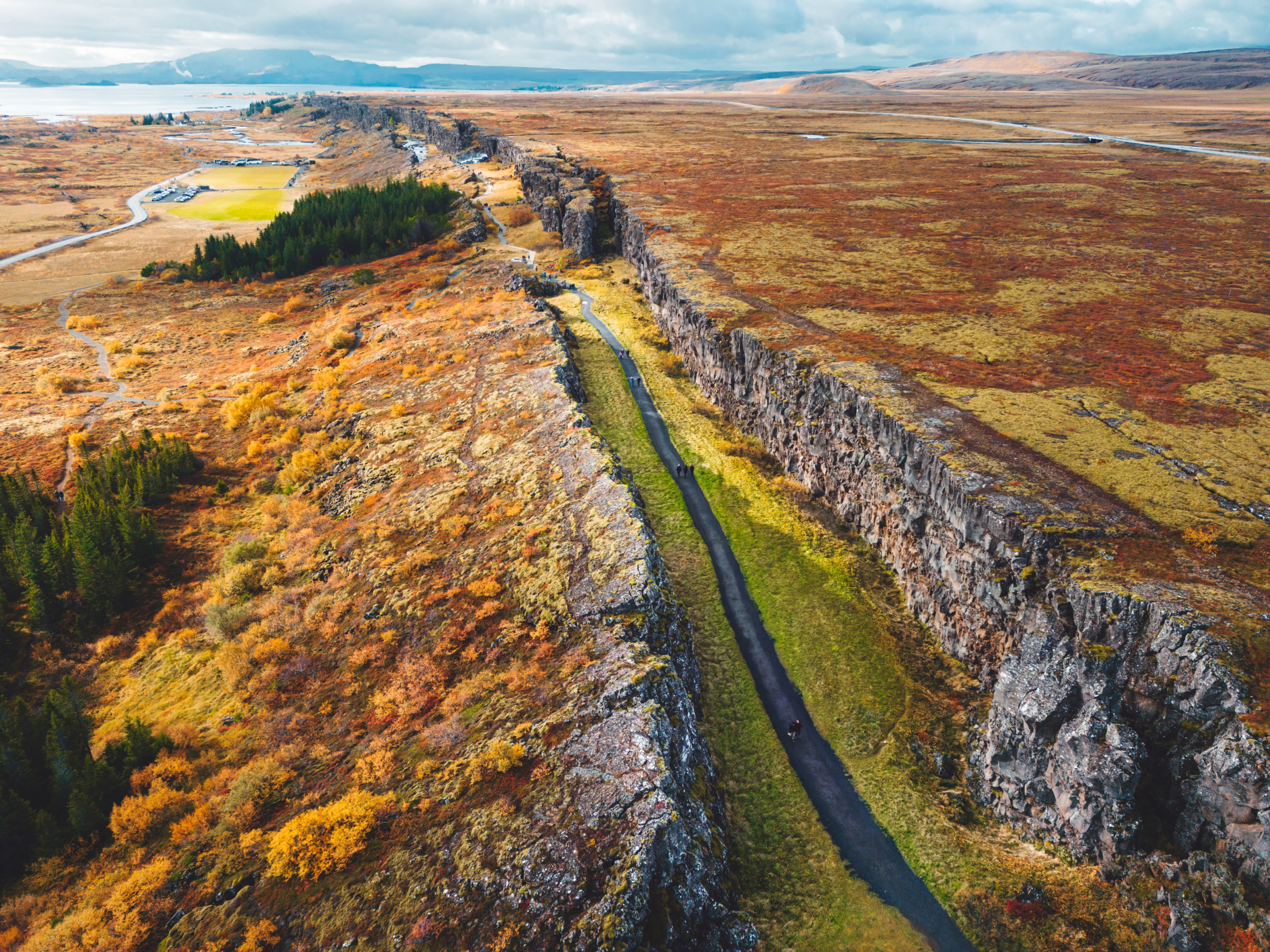 Aerial view of Thingvellir National Park in the Golden Circle, showing the rift valley between plates in autumn colors.
