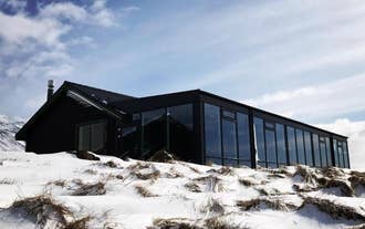 Hofsstadir Country Hotel surrounded by snow.