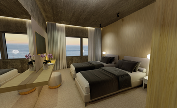 Chambre lumineuse avec lits jumeaux et grandes baies vitrées au Black Sand Hotel.