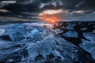 Ice crystals glistening like diamonds on the black sands of Diamond Beach.