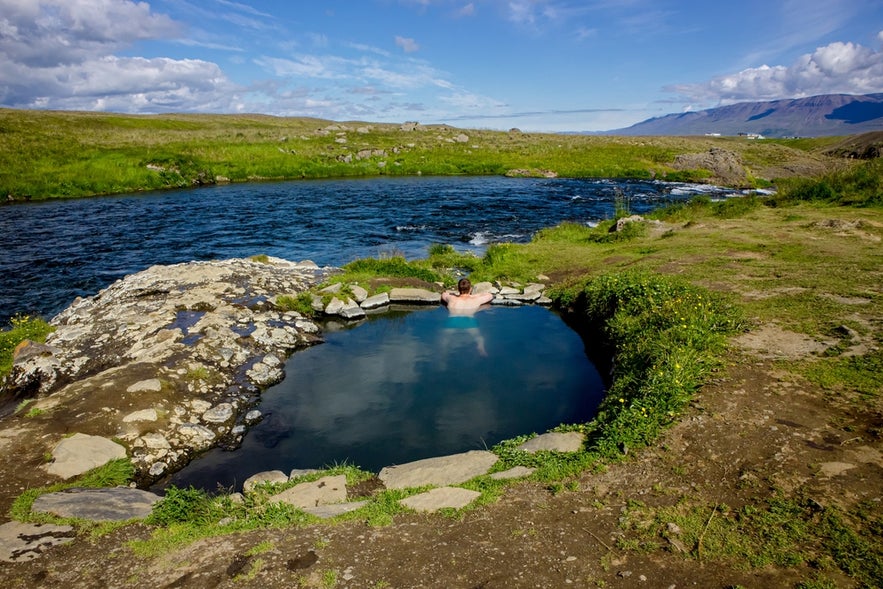 Fosslaug Hot Spring located near Reykjafoss Waterfalls